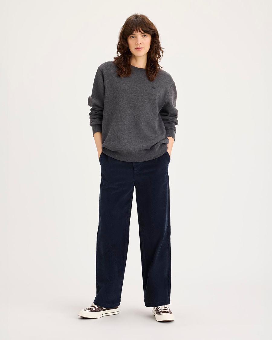 Front view of model wearing Total Eclipse Blake Chino, High Straight Fit.