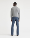 Back view of model wearing Vintage Indigo Men's Slim Fit Smart 360 Flex California Chino Pants.